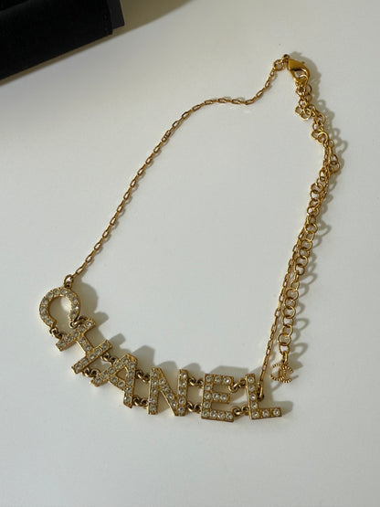 1990’s Chanel Metal Crystal Icon Logo Gold Necklace