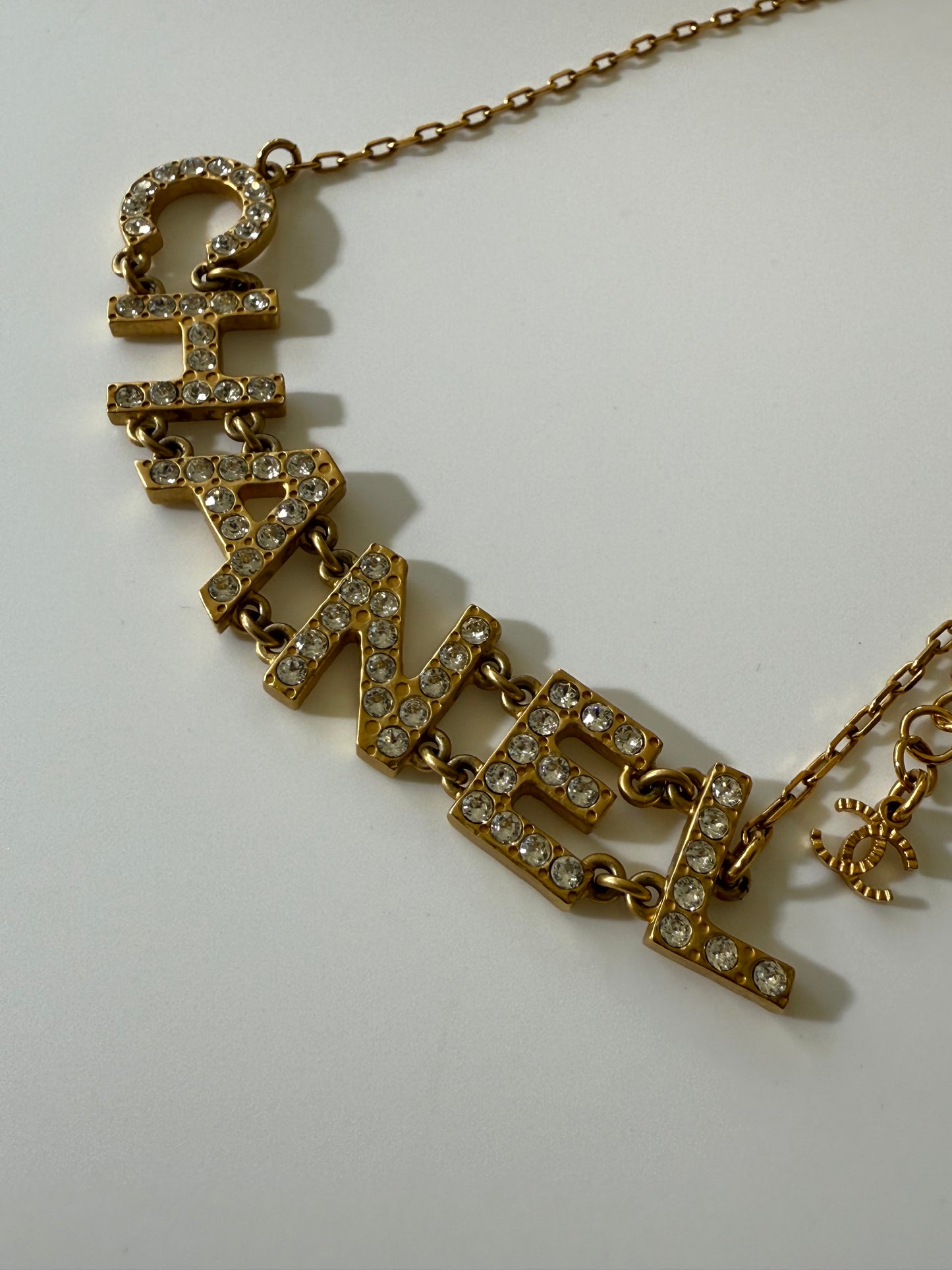 1990’s Chanel Metal Crystal Icon Logo Gold Necklace